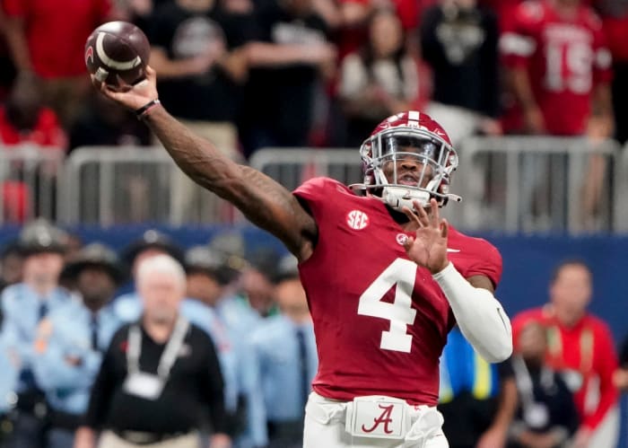 Dec 2, 2023; Atlanta, GA, USA; Alabama Crimson Tide quarterback Jalen Milroe (4) throws against Georgia at Mercedes-Benz Stadium. Milroe was named the MVP. Alabama defeated Georgia 27-24 to claim the SEC Championship. Mandatory Credit: Gary Cosby Jr.-USA TODAY Sports